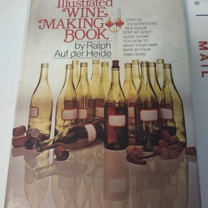 May include: The Illustrated Wine Making Book by Ralph Auf der Heide, a book cover with over 50 illustrations in a clear step-by-step guide showing how to make your own wine at home.