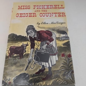 May include: A book cover with an illustration of a woman holding a Geiger counter. The book title is "Miss Pickerell and the Geiger Counter" by Ellen MacGregor. The book is illustrated by Paul Galdone.