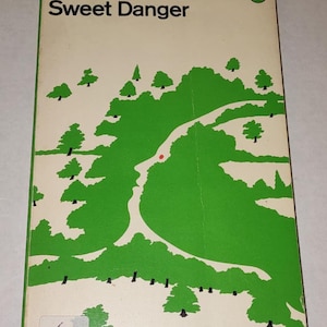 May include: A vintage paperback book cover with a green and white illustration of a winding path through a forest. The title "Sweet Danger" by Margery Allingham is printed in black text on a white background.