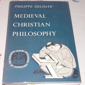 May include: A teal book titled "Medieval Christian Philosophy" by Philippe Delhaye. The cover features an illustration of a monk writing at a desk. The book is part of "The Twentieth Century Encyclopedia of Catholicism."