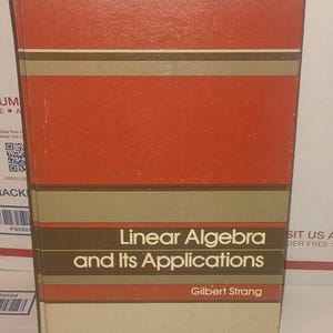 May include: A set of three ceramic mugs with a speckled, matte finish. The mugs are in shades of cream, light gray, and dark gray. Each mug has a simple, minimalist design, perfect for coffee or tea.