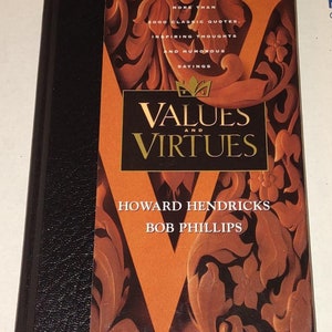 May include: A book titled "Values and Virtues" by Howard Hendricks and Bob Phillips. The cover features a large, ornate "V" with a gold crown and floral designs in shades of brown, orange, and red.