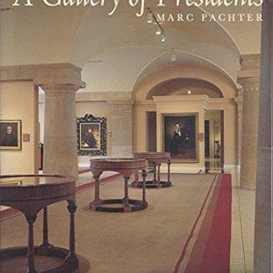 May include: A book titled "A Gallery of Presidents" by Marc Pachter. The cover features a photograph of a hallway with a red carpet and several ornate tables. The hallway is lined with paintings of presidents.