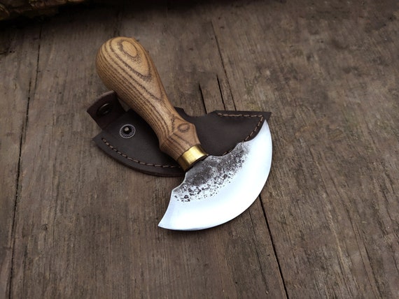 Round knife or head knife for leather work.