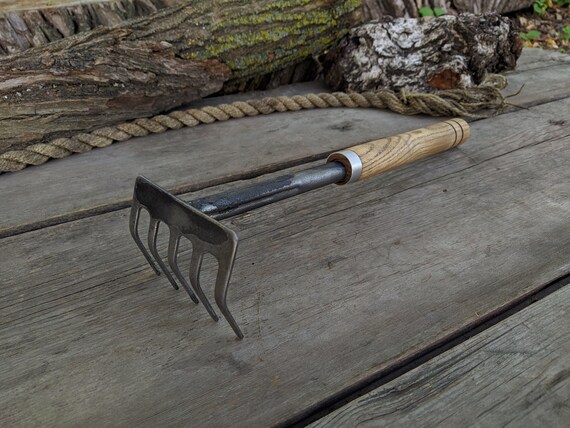Forged Hand Rake. Rake. Forged Tool. A Tool for Rural Work. Garden