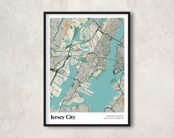May include: A black and white map of Jersey City, New Jersey, with a blue body of water and green land masses. The map is framed in a black frame and has the text "Jersey City" and "UNITED STATES 40.717°N 74.080°W" at the bottom.
