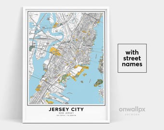 May include: Framed map print of Jersey City, New Jersey, with street names. The map features a detailed layout of the city with blue water areas and yellow and green land areas. The text "JERSEY CITY" is at the bottom.