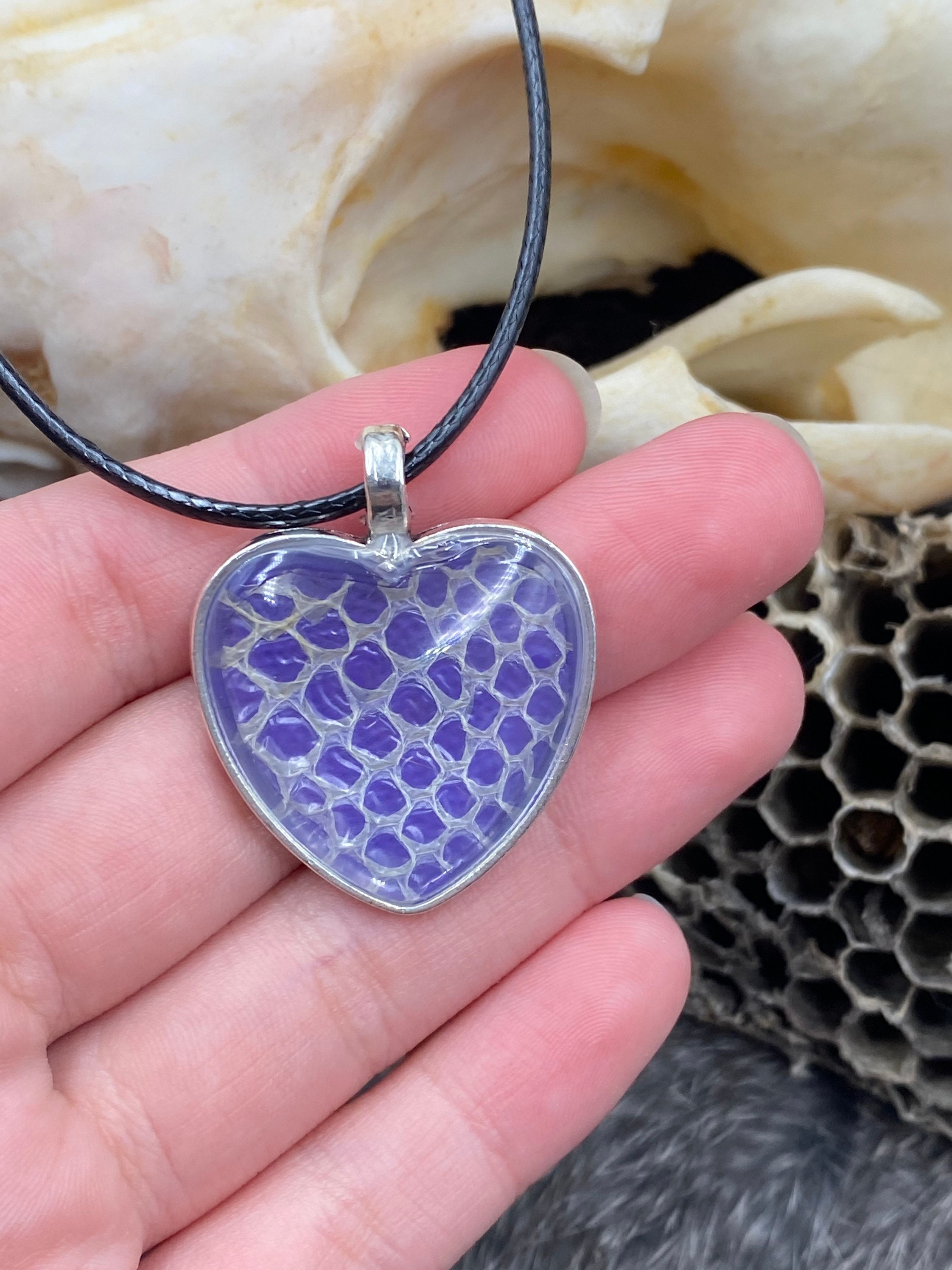 Snake shed necklace purple background Etsy