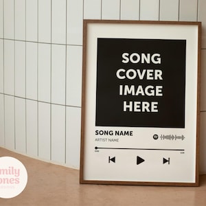 May include: A framed print featuring a white background with a black square displaying "SONG COVER IMAGE HERE." Below, it reads "SONG NAME" and "ARTIST NAME." Includes a music player interface with play/pause buttons and a progress bar.