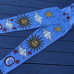 Hand Painted Custom Denim Overalls Dungarees with Celetial Stars, Suns, Moons and Clouds