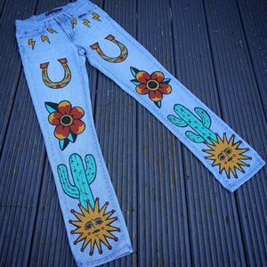 Hand Painted Custom Levis Jeans with Western Cowboy Style Suns, Cactus, Horseshoe and Flowers