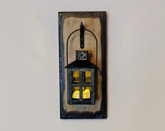 Scorched Edge Sconce with lantern and tea light