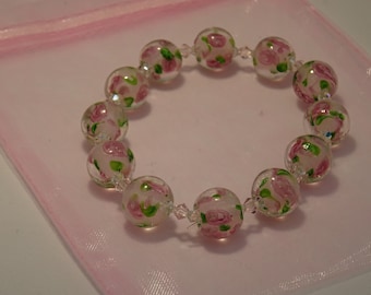 Handmade lampwork bead set of 7 magenta and pink swirly beads