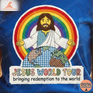 May include: Blue t-shirt featuring a colorful embroidered design. The design includes a rainbow, a depiction of Jesus, and a globe. Text on the shirt reads "JESUS WORLD TOUR" and "bringing redemption to the world."
