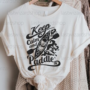 Digital download of a canoe and paddle design with quote for outdoor enthusiasts using Cricut or Silhouette machines.