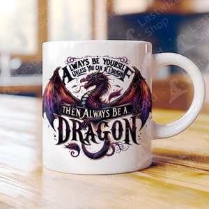 May include: White ceramic mug with a colorful illustration of a dragon with the text "Always be yourself unless you can be a dragon then always be a dragon".