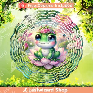 May include: A metal wind spinner with a green frog wearing a flower crown sitting on a pink lotus flower. The spinner has multiple layers of swirling metal, creating a mesmerizing effect as it spins in the wind. The background is a blurred image of green leaves and flowers.