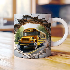May include: White ceramic mug with a 3D design of a yellow school bus driving through a cracked wall. The bus has the words "SCHOOL BUS" on the front.