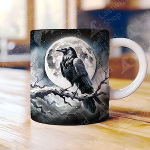 May include: A black and white mug with a raven perched on a branch in front of a full moon. The raven has a detailed design and the moon has a textured surface.