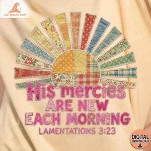 May include: Cream-colored t-shirt featuring a colorful patchwork sun design with the text "His mercies are new each morning, Lamentations 3:23." The sun design includes various patterns and colors, with a digital download icon.