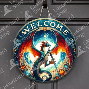 May include: Round wooden welcome sign featuring a dragon with a sword, wings, and the word "WELCOME". The sign has a blue border and a fantasy theme. The dragon is teal and red.