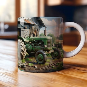 May include: White ceramic mug featuring a detailed illustration of a vintage green tractor in a rural setting. The design includes a barn, farm tools, and a field, evoking a rustic, agricultural theme.