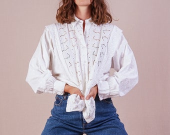 White ruffled vintage blouse with embroidered details