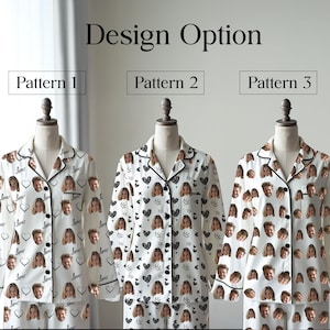 May include: Three sets of white pajamas with different patterns are displayed. Pattern 1 features faces, hearts, and the word "love." Pattern 2 has faces, hearts, and crowns. Pattern 3 is covered in faces. All have black trim.