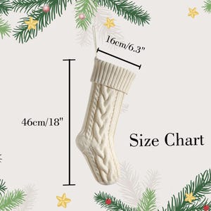 May include: Cream-colored Christmas stocking with a cable knit design. The stocking is 18 inches (46 cm) long and 6.3 inches (16 cm) wide. The text "Size Chart" is displayed on the image.