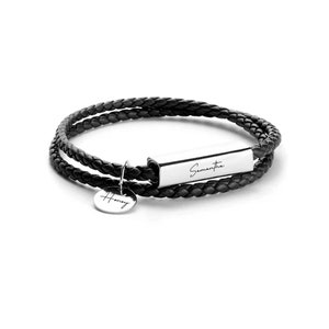 May include: Black leather bracelet with a silver bar charm engraved with the name "Samantha" and a round charm engraved with the word "Honey".