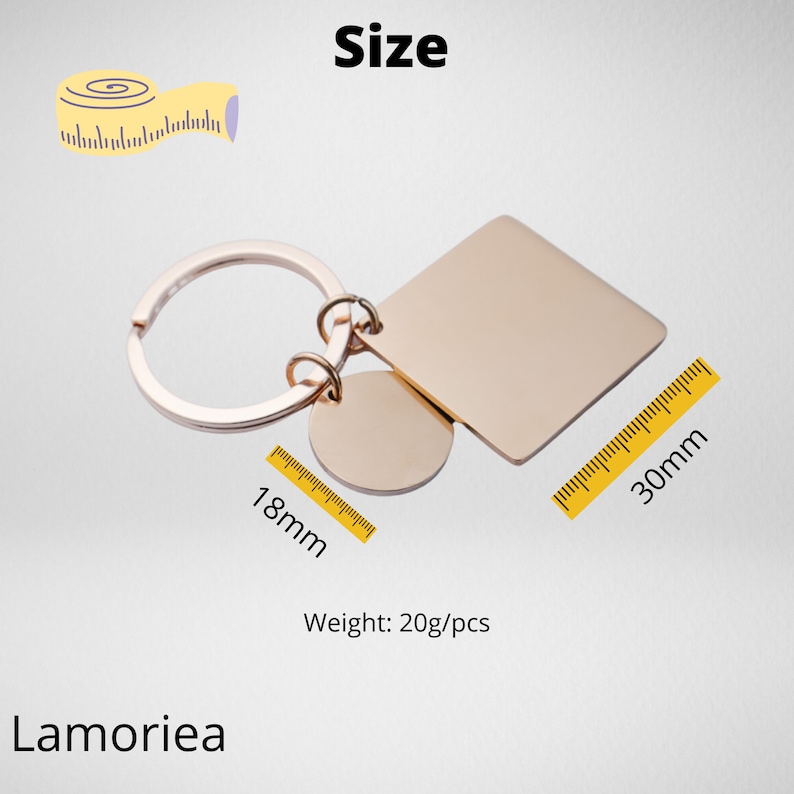 May include: Gold-toned keychain with a round charm and a square tag. The square tag measures 30mm and the round charm measures 18mm.  The keychain weighs 20 grams per piece.  "Lamoriena" is printed on the bottom of the image.
