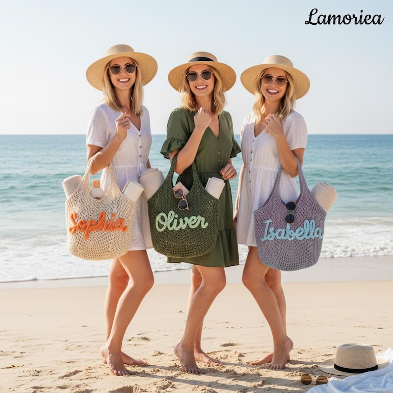May include: Three straw tote bags with personalised names embroidered on the front. The first bag is cream with orange text reading Sophia, the second is olive green with light green text reading Oliver, and the third is lavender with blue text reading Isabella.