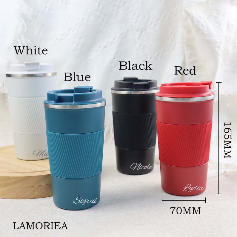 May include: Four insulated travel mugs in white, blue, black, and red with personalized names. The mugs are 7 cm in diameter and 16.5 cm tall.