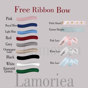 May include: Image showcasing a variety of ribbons in different colors and styles. The image includes solid ribbons in pink, royal blue, light blue, red, grey, champagne gold, black, white, and emerald green. Also shown are ribbons with pink hearts, green stripes, and lace ribbons with the text "YOU".