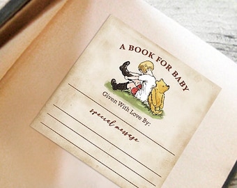 May include: A printable bookplate featuring Winnie the Pooh and a young girl. The bookplate has a cream background with brown text that reads "A Book for Baby" and "Given with Love By:" with a space for a special message.