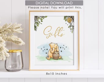 May include: A framed print featuring Winnie the Pooh with a honey pot, surrounded by bees. The word "Gifts" is written in gold script. The print measures 8x10 inches and is a digital download.