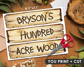 May include: Printable 8.5" x 11" sign with a woodgrain background. The sign has three lines of text: Bryson's Hundred Acre Wood. You print and cut the sign.