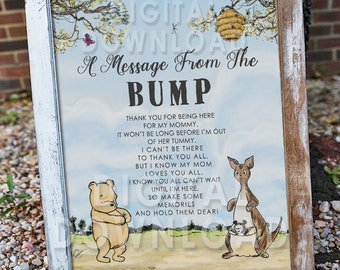 May include: A Winnie the Pooh themed baby shower sign with a message from the bump. The sign features Winnie the Pooh and Kanga with Roo in her pouch. The text reads: "Thank you for being here for my mommy. It won't be long before I'm out of her tummy. I can't be there to thank you all, but I know my mom loves you all. I know you all can't wait until I'm here, so make some memories and hold them dear!"