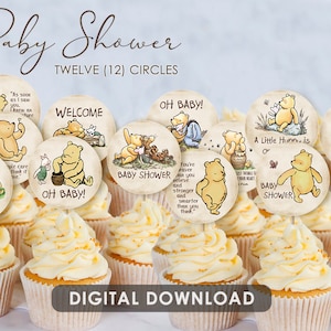 May include: Twelve Winnie the Pooh themed cupcake toppers featuring various quotes and images. The toppers are printed on a cream background with brown text and images. The toppers are ideal for a baby shower.
