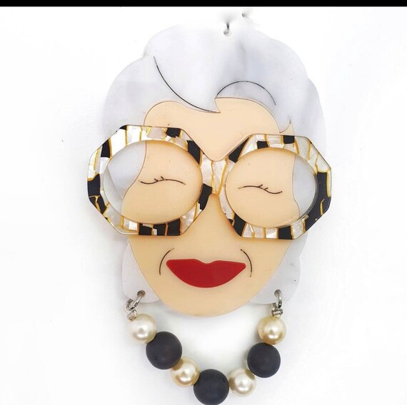 Iris apfel brooch deals