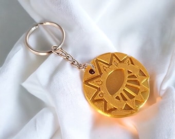 Mysterious Cities of Gold medallion keychain