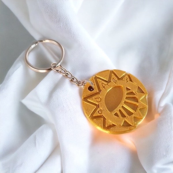 Mysterious Cities of Gold medallion keychain