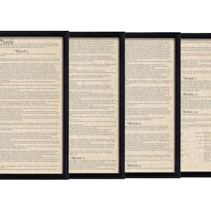 May include: A framed print of the United States Constitution, featuring the text "We the People" and the preamble, followed by seven articles outlining the framework of the U.S. government.
