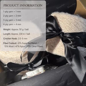 May include: Two balls of beige fuzzy yarn tied with a black satin ribbon. Text overlay lists product information: 1-ply yarn = 1 mm, 2-ply yarn = 2 mm, 3-ply yarn = 3 mm, 4-ply yarn = 4 mm, Weight: Approx. 50 g / ball, Length: Approx. 230 m / ball.