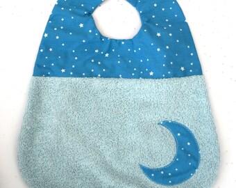 Blue baby bib in organic sponge and printed fabric for baby moon pattern