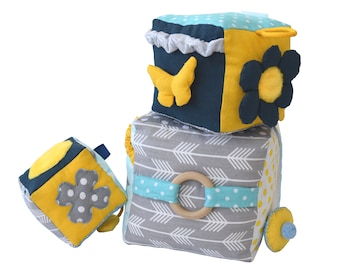 Set of three baby awakening cubes in yellow navy blue fabric and gray Montessori-inspired sensory toys