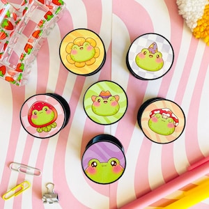 Kawaii Frosch Telefon Griff, niedlicher frecher Frosch faltbarer Telefonhalter, wiederaufladbare Telefonsteckdose, Tablet Kindle Halter GripTok Mount Stand