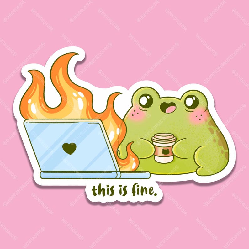 Op de afbeelding: Een gestanste sticker met een groene kikker die een koffiebeker vasthoudt, zittend naast een laptop die omringd is door oranje en gele vlammen. Het laptopscherm toont een zwart hartje. Onder de illustratie staat de tekst this is fine.