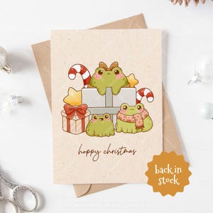 Cartão de felicitações de sapos de Natal alegres, cartão de bengalas de doces com sapos fofos e presentes, cartão postal A6 em branco para férias com envelope artesanal