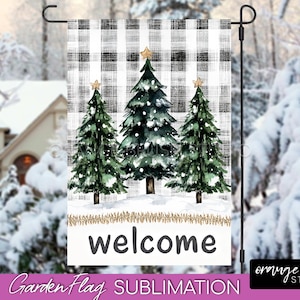 May include: A white and black buffalo plaid garden flag with three green watercolor Christmas trees and gold stars. The flag has the word "welcome" written in black on a white background.